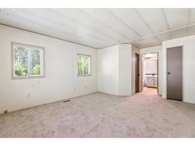 a bathroom with a sink vanity and a mirror