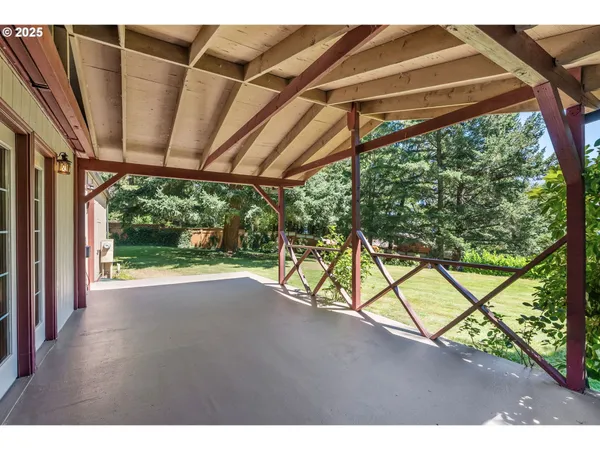 a view of a house with porch and furniture
