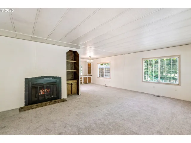 a kitchen with a sink stove top oven and cabinets
