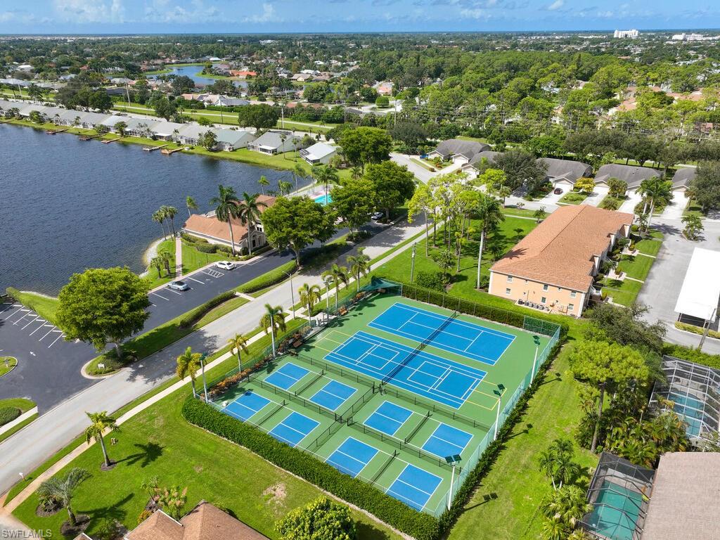 2126 East Crown Pointe Boulevard Naples, FL 34112 - Photo 24 of 26 an aerial view of a city