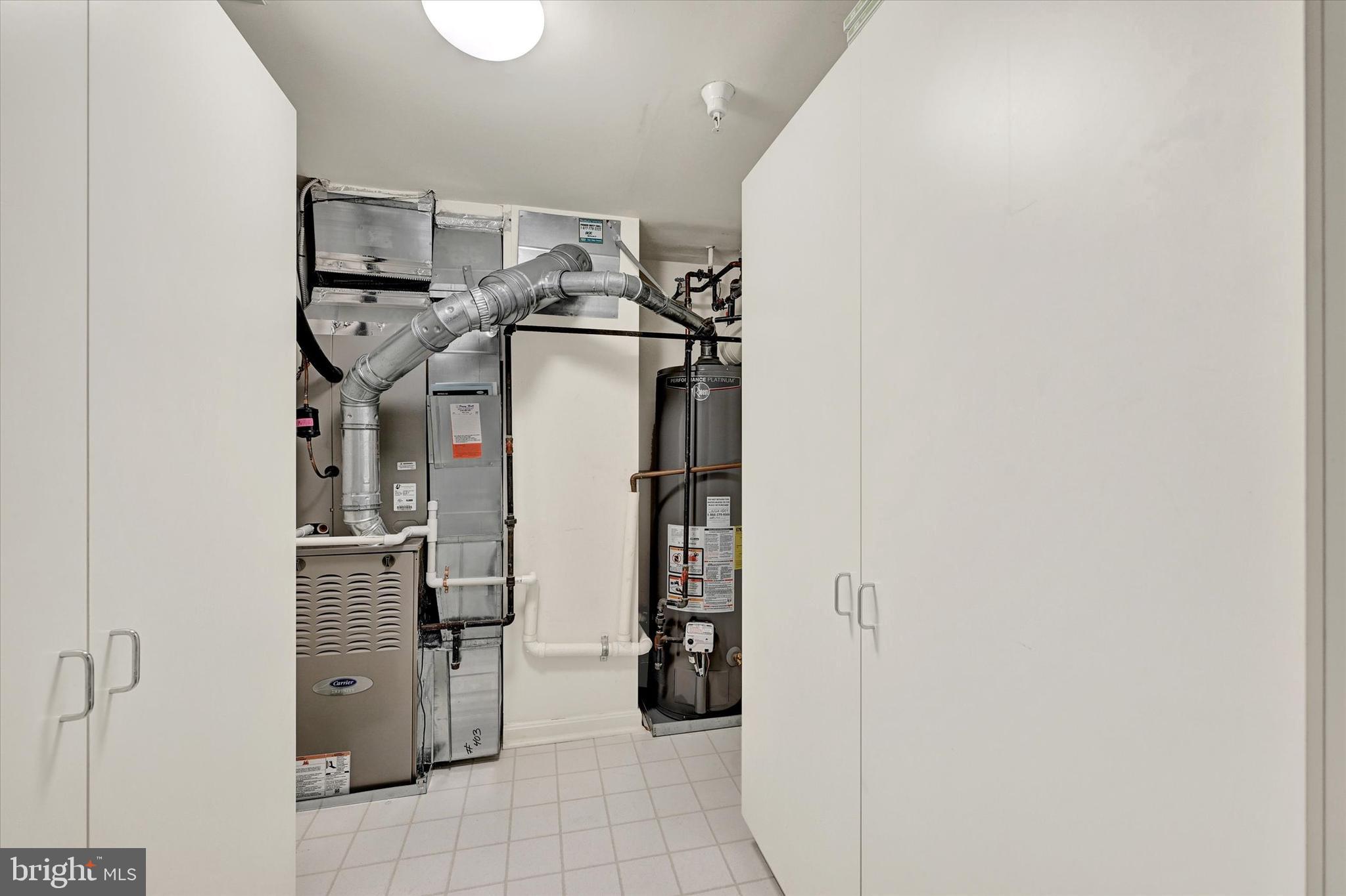 12330 Rosslare Ridge Road, Unit 403 Lutherville-Timonium, MD 21093 - Photo 30 of 33 Utilityrm w/built in storage,furnace & ht wtr 2019