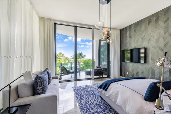 a bathroom with a double vanity sink mirror and shower