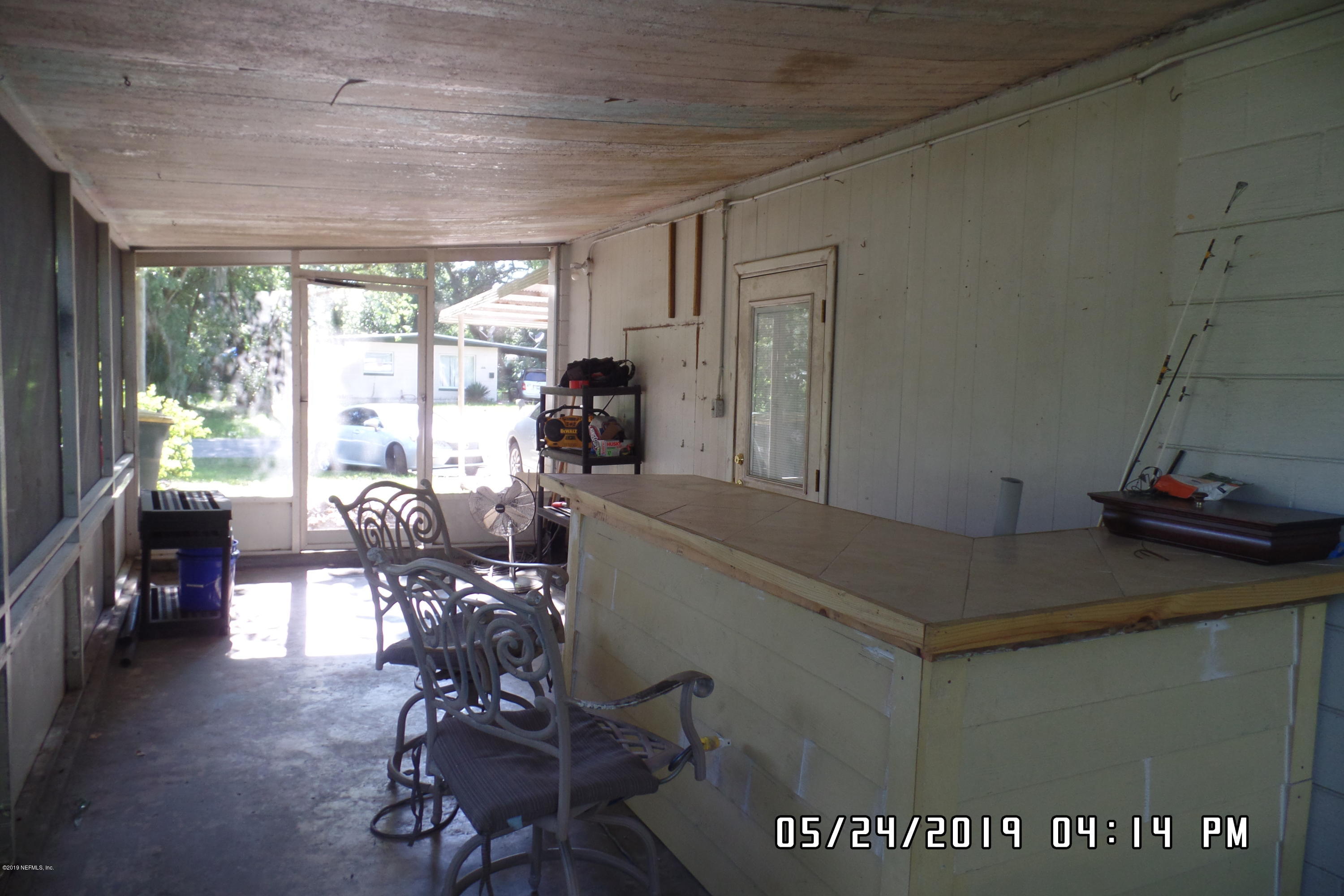 2925 Kent Road Jacksonville, FL 32216 - Photo 20 of 24 a view of a workspace with furniture window and outside view