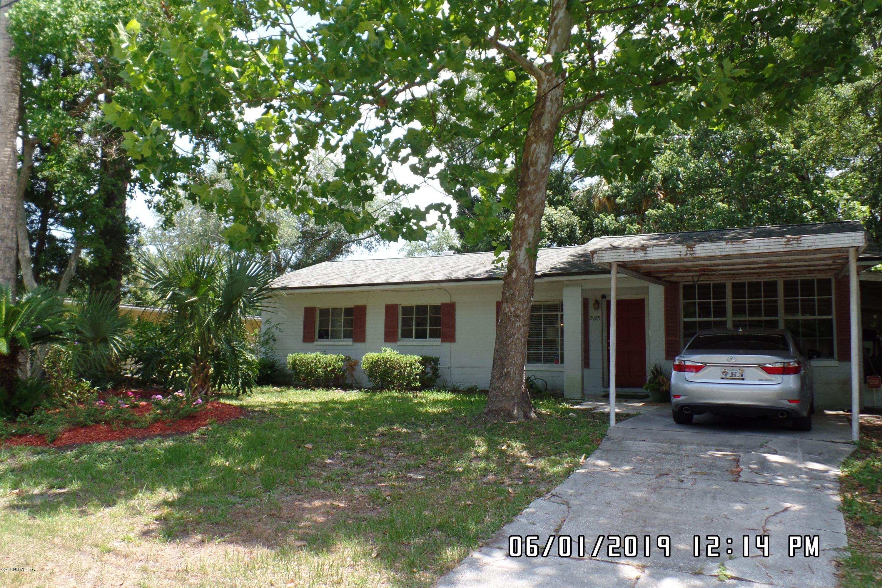 2925 Kent Road Jacksonville, FL 32216 - Photo 2 of 24 a house view with a garden space