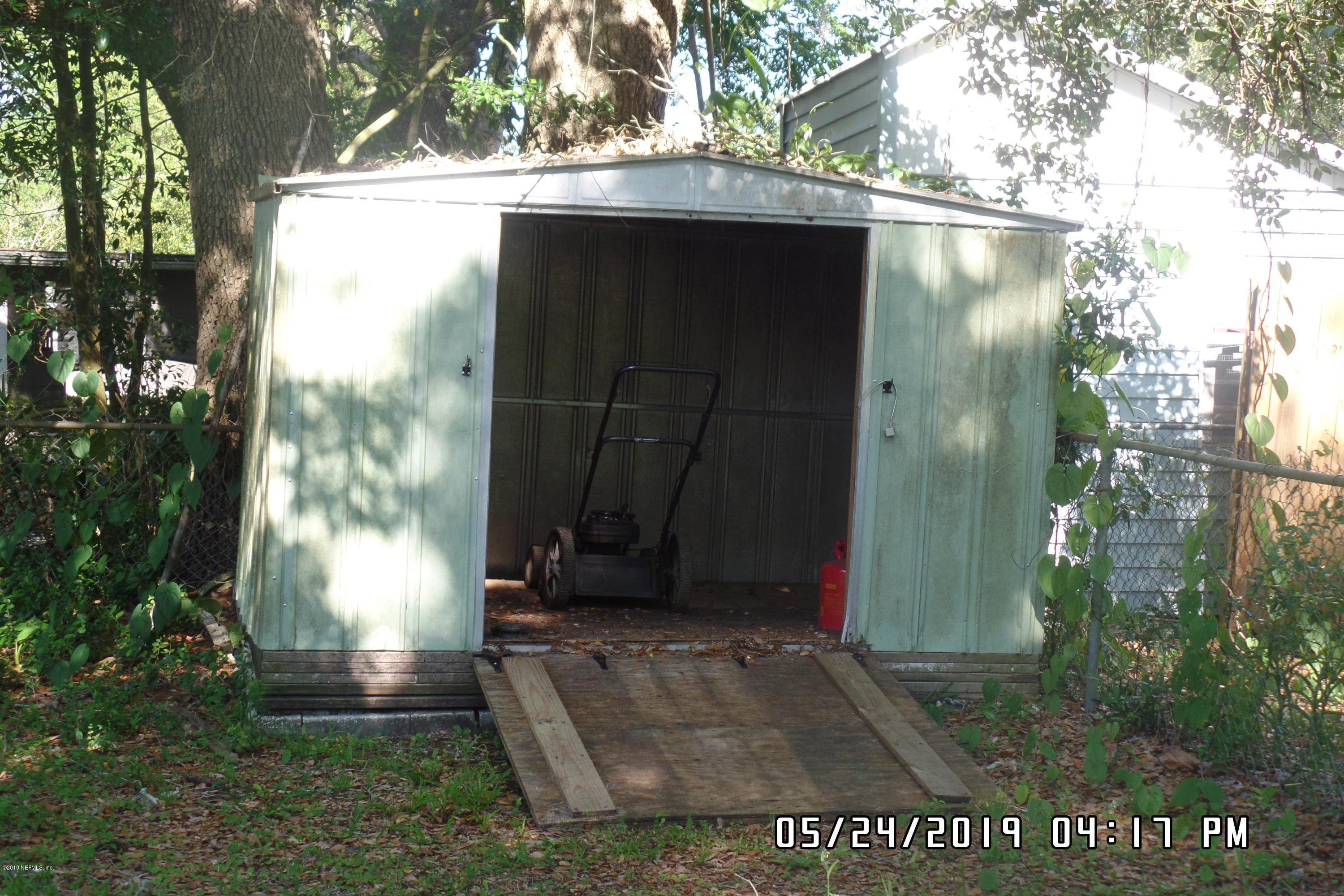 2925 Kent Road Jacksonville, FL 32216 - Photo 23 of 24 a view of backyard with green space