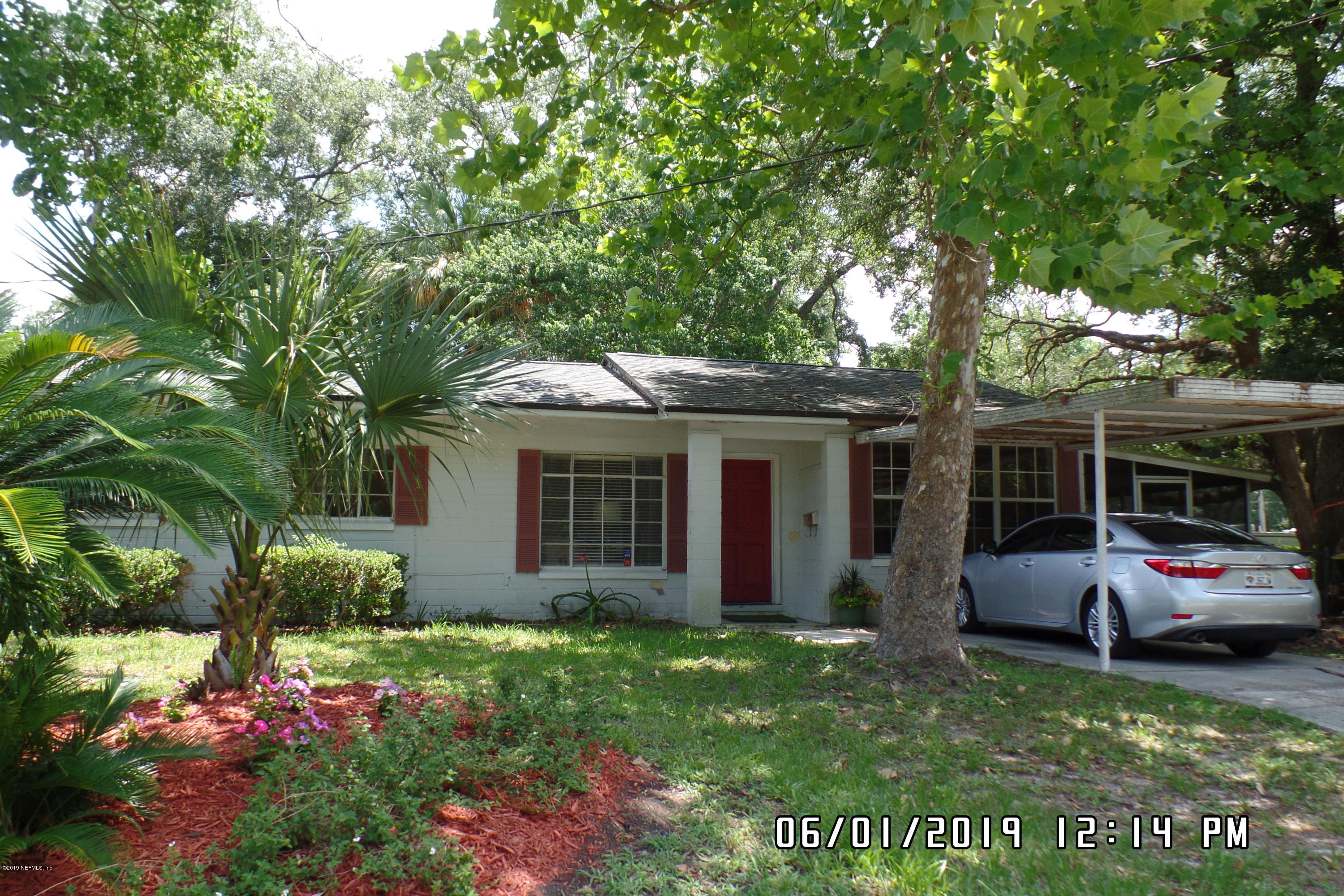 2925 Kent Road Jacksonville, FL 32216 - Photo 3 of 24 a view of a house with a garden