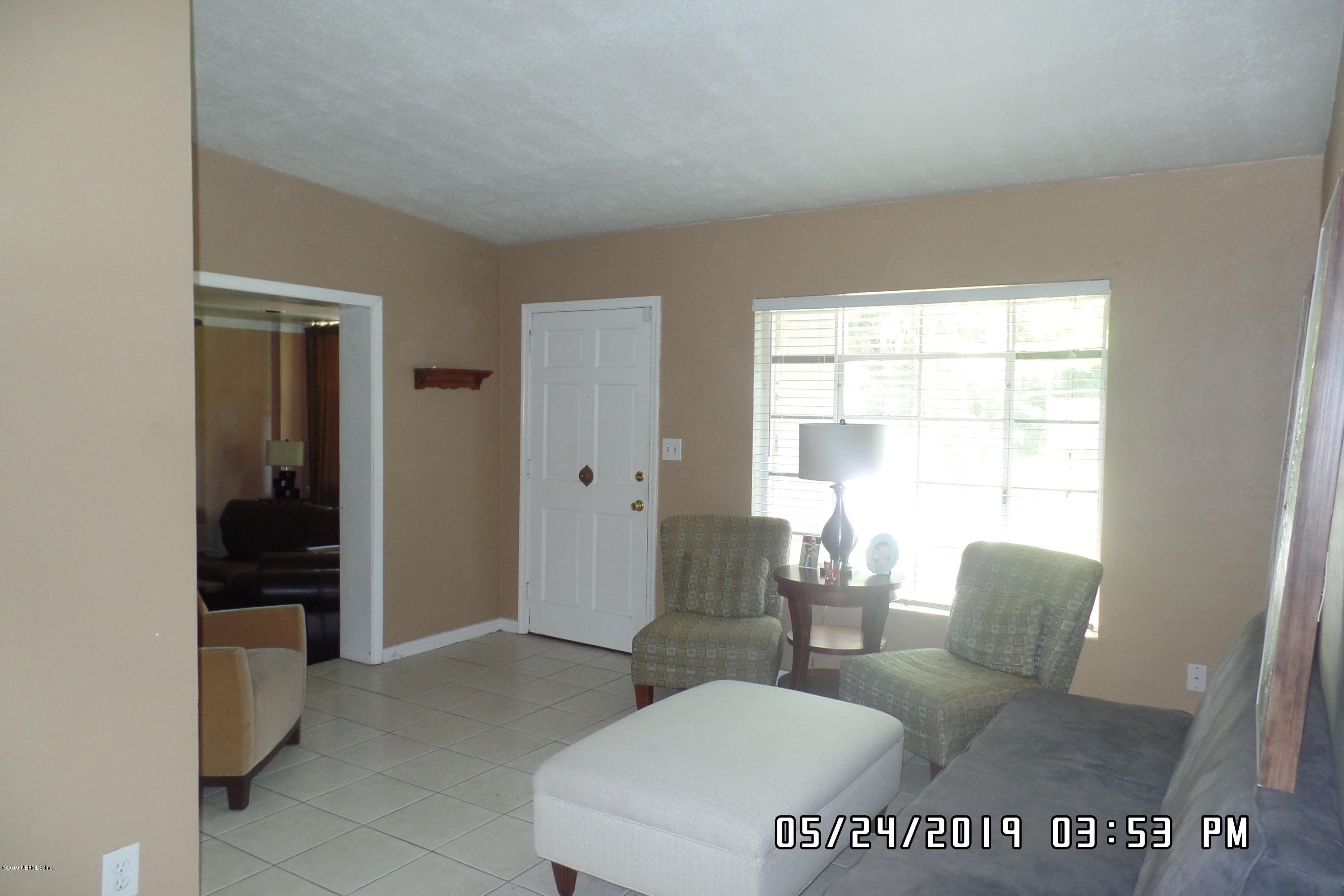 2925 Kent Road Jacksonville, FL 32216 - Photo 5 of 24 a view of a livingroom with furniture and windows