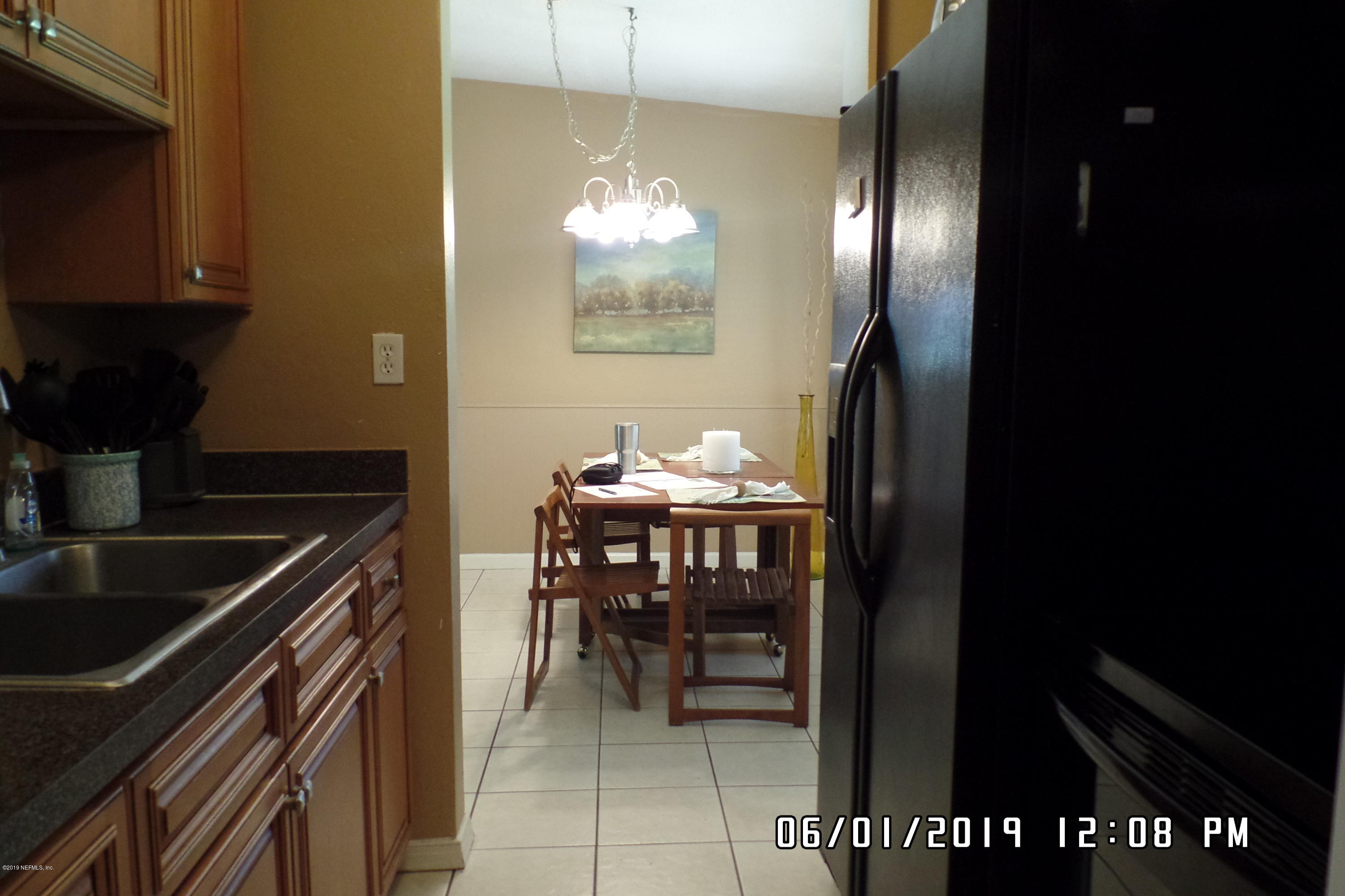 2925 Kent Road Jacksonville, FL 32216 - Photo 10 of 24 a kitchen with a table and chairs in it