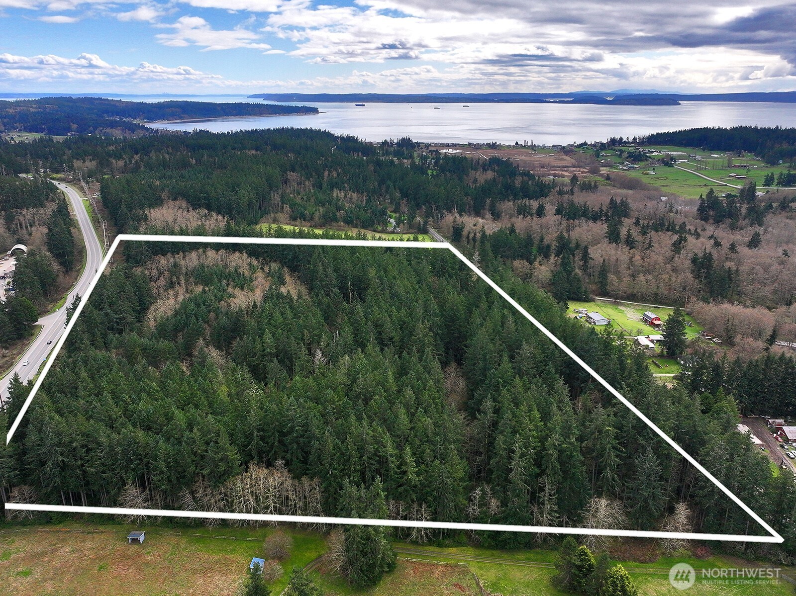 -xxx Mutiny Bay Road Freeland, WA 98249 - Photo 25 of 27 a view of city with a small pool