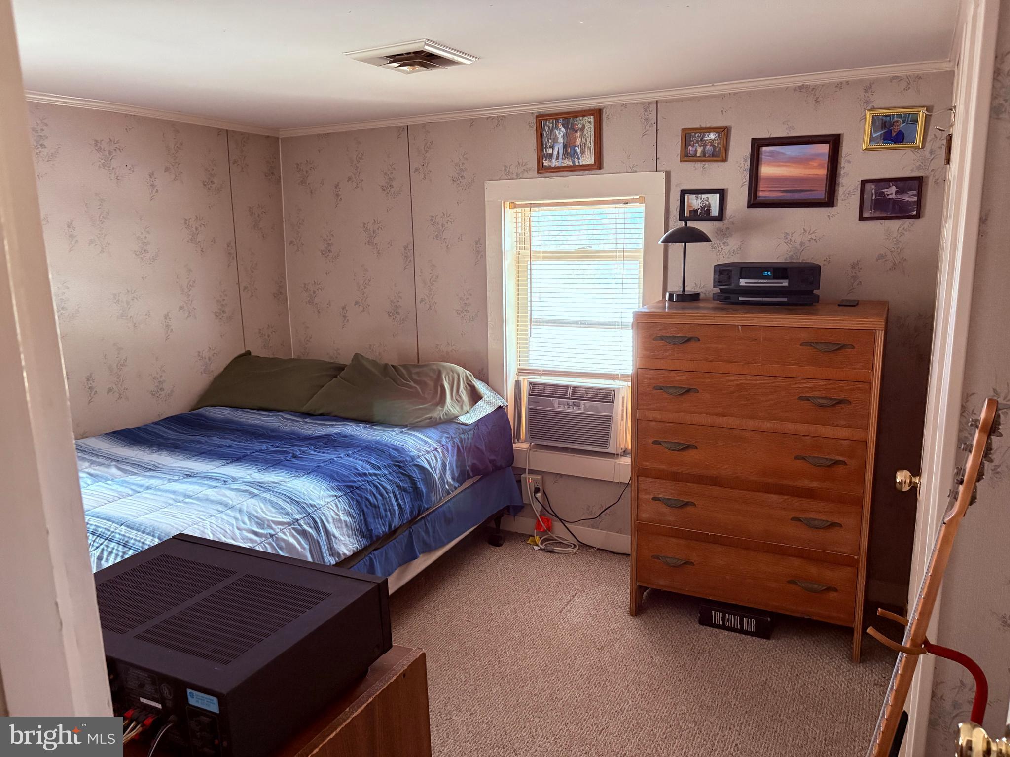 31867 Shavox Road Salisbury, MD 21804 - Photo 22 of 64 a bedroom with a bed and a desk