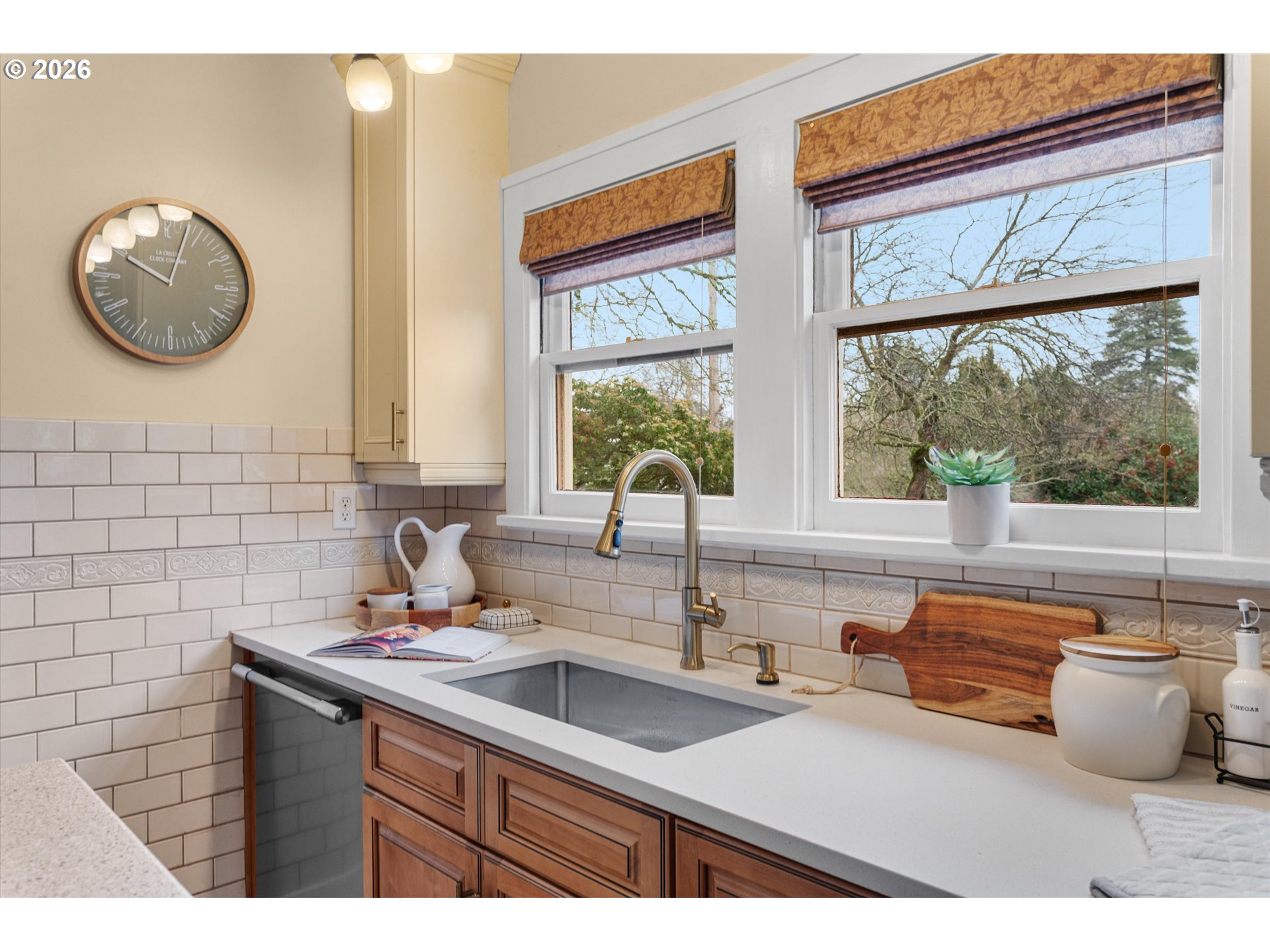 1706 Southeast Knapp Street Portland, OR 97202 - Photo 12 of 43 a bathroom with a sink and a mirror