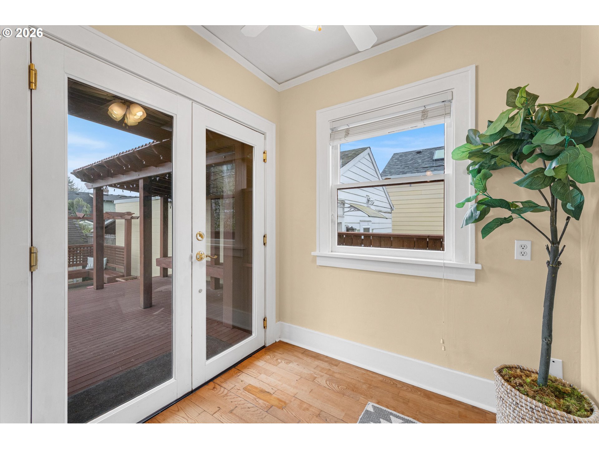 1706 Southeast Knapp Street Portland, OR 97202 - Photo 14 of 43 a view of a hallway with wooden floor and a potted plant