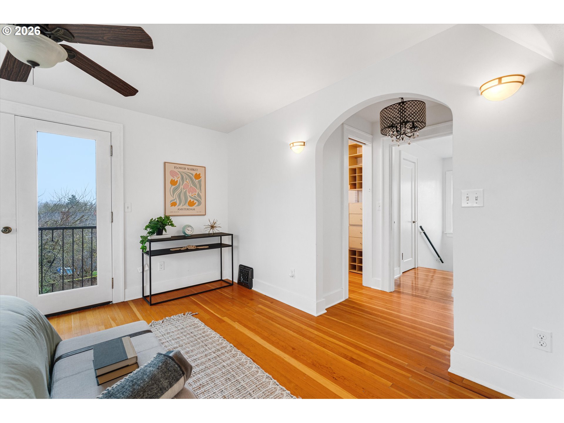 1706 Southeast Knapp Street Portland, OR 97202 - Photo 20 of 43 a bedroom with a bed and a window