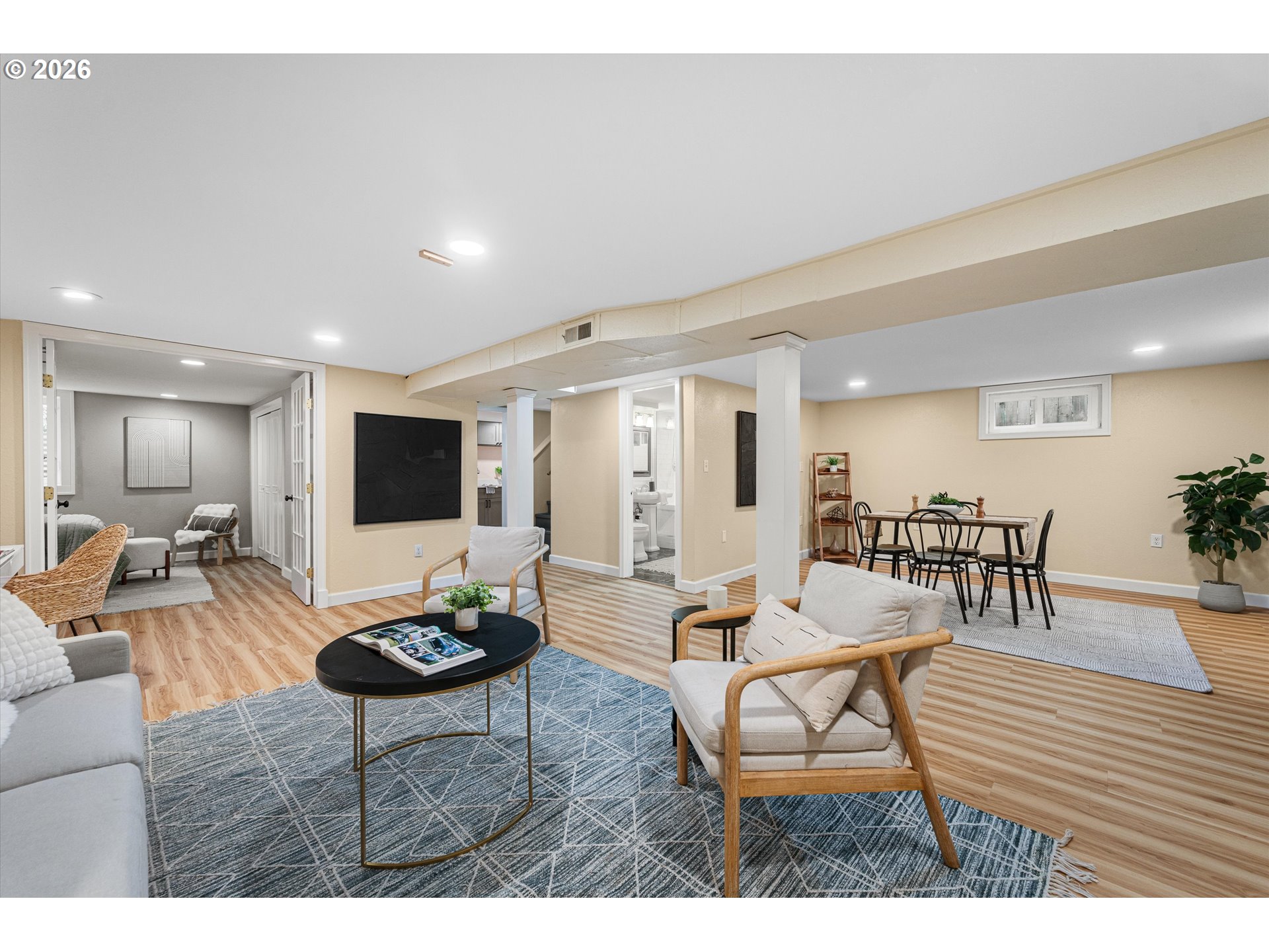 1706 Southeast Knapp Street Portland, OR 97202 - Photo 27 of 43 a living room with furniture and a wooden floor
