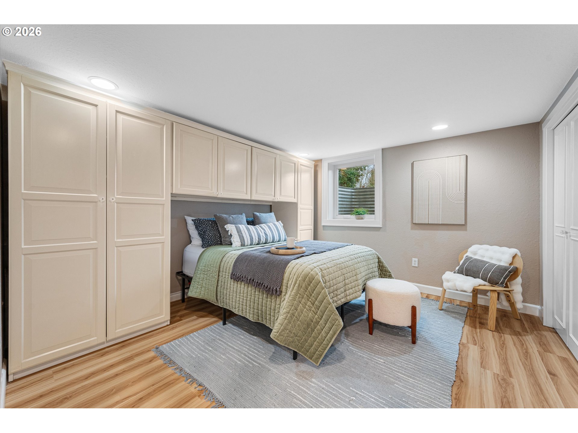 1706 Southeast Knapp Street Portland, OR 97202 - Photo 30 of 43 a bedroom with a bed and a table