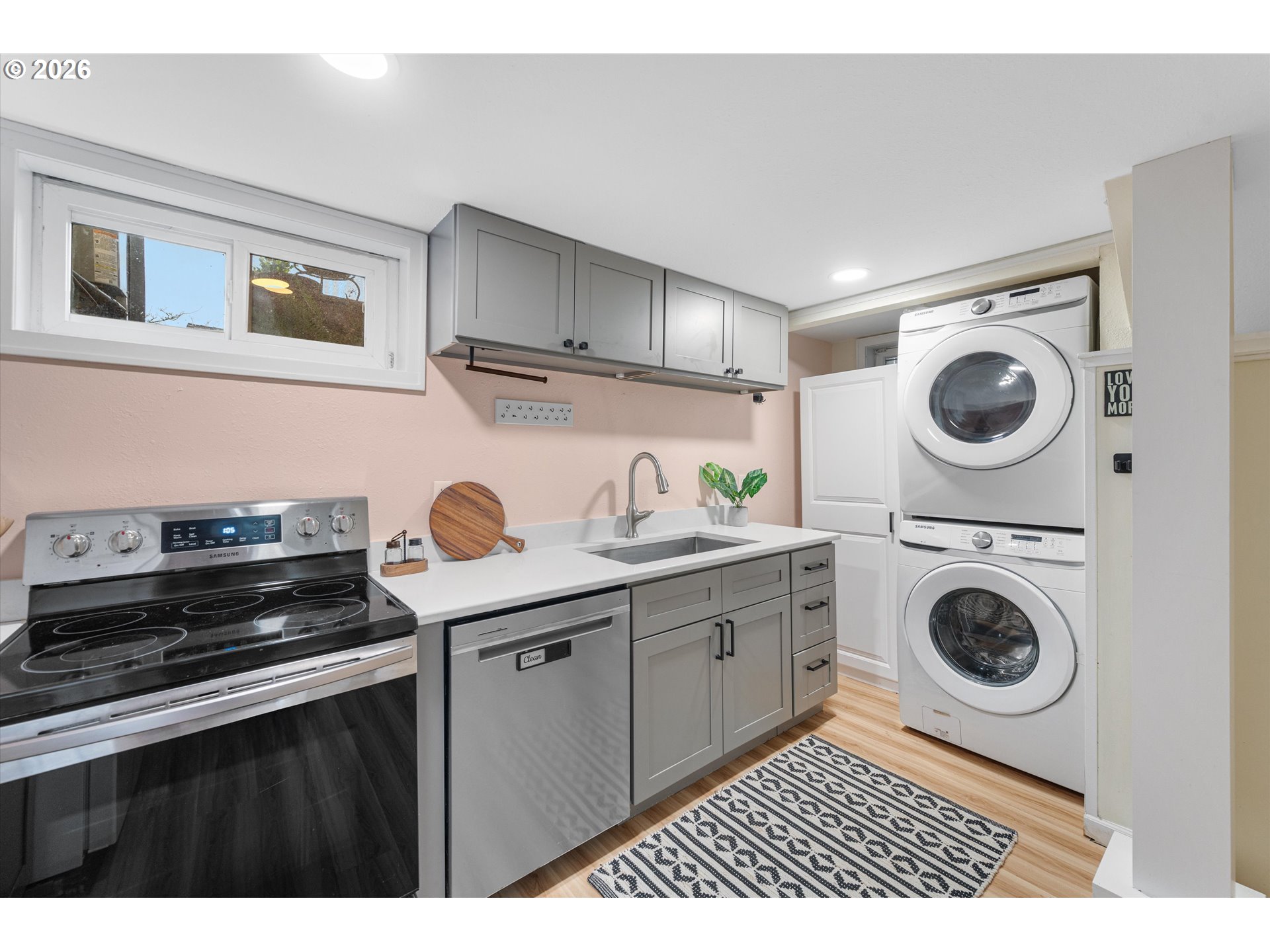 1706 Southeast Knapp Street Portland, OR 97202 - Photo 32 of 43 a kitchen with a stove and cabinets