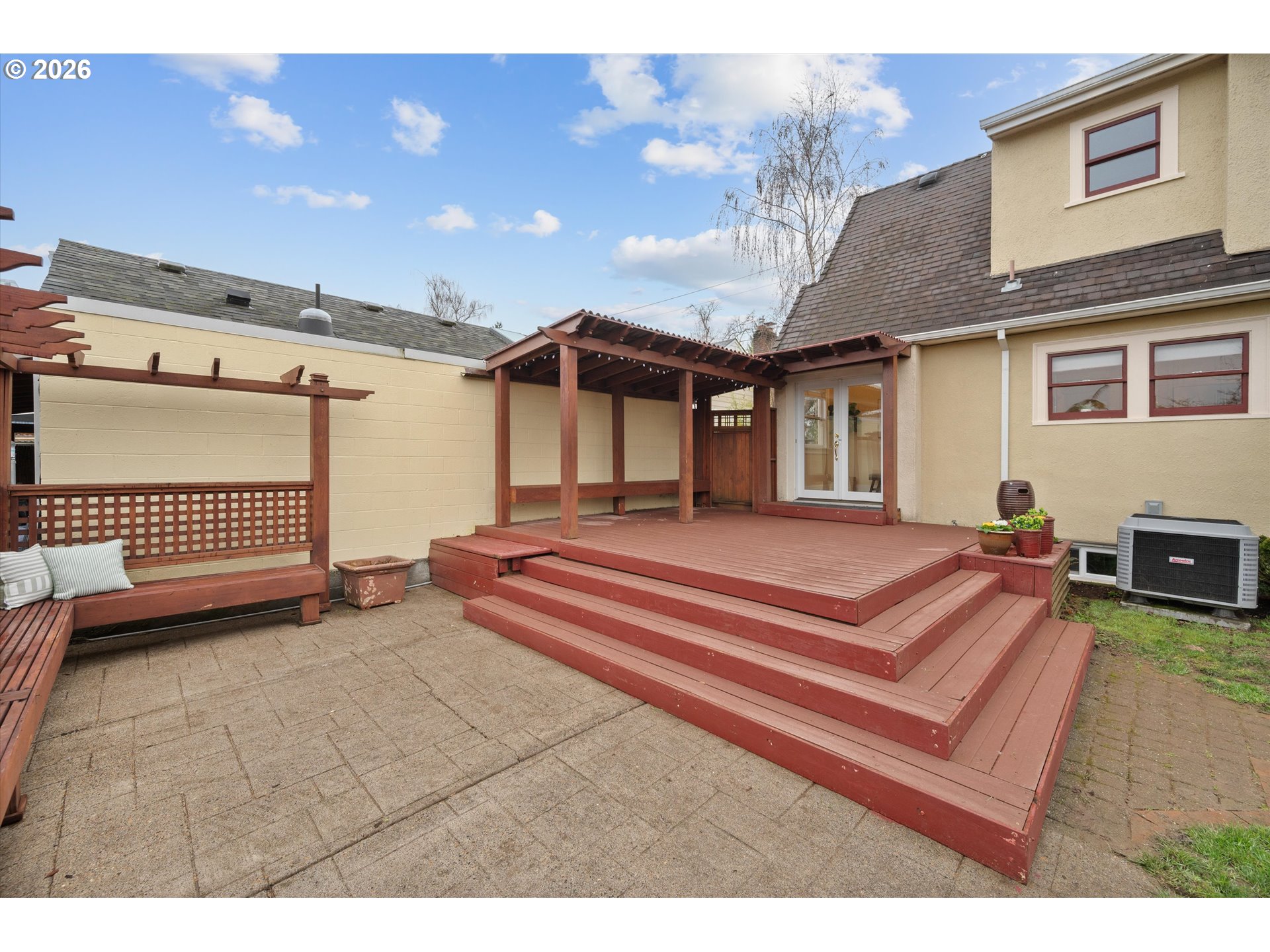 1706 Southeast Knapp Street Portland, OR 97202 - Photo 35 of 43 a spacious bedroom with a bed and a view of bedroom