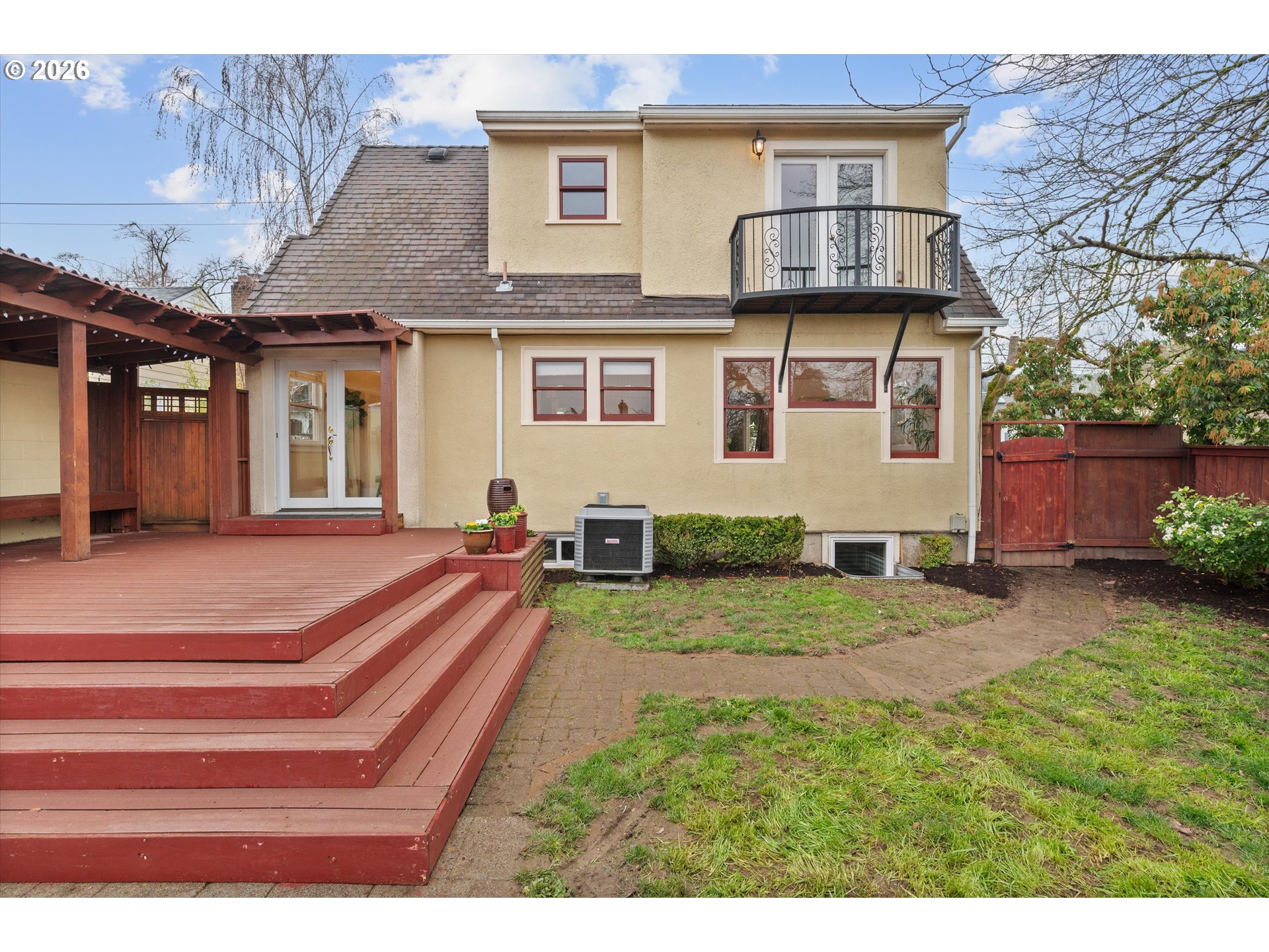 1706 Southeast Knapp Street Portland, OR 97202 - Photo 36 of 43 a front view of a house with a yard