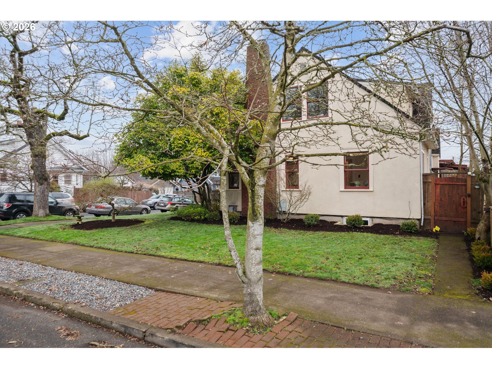 1706 Southeast Knapp Street Portland, OR 97202 - Photo 41 of 43 a view of a backyard with large trees