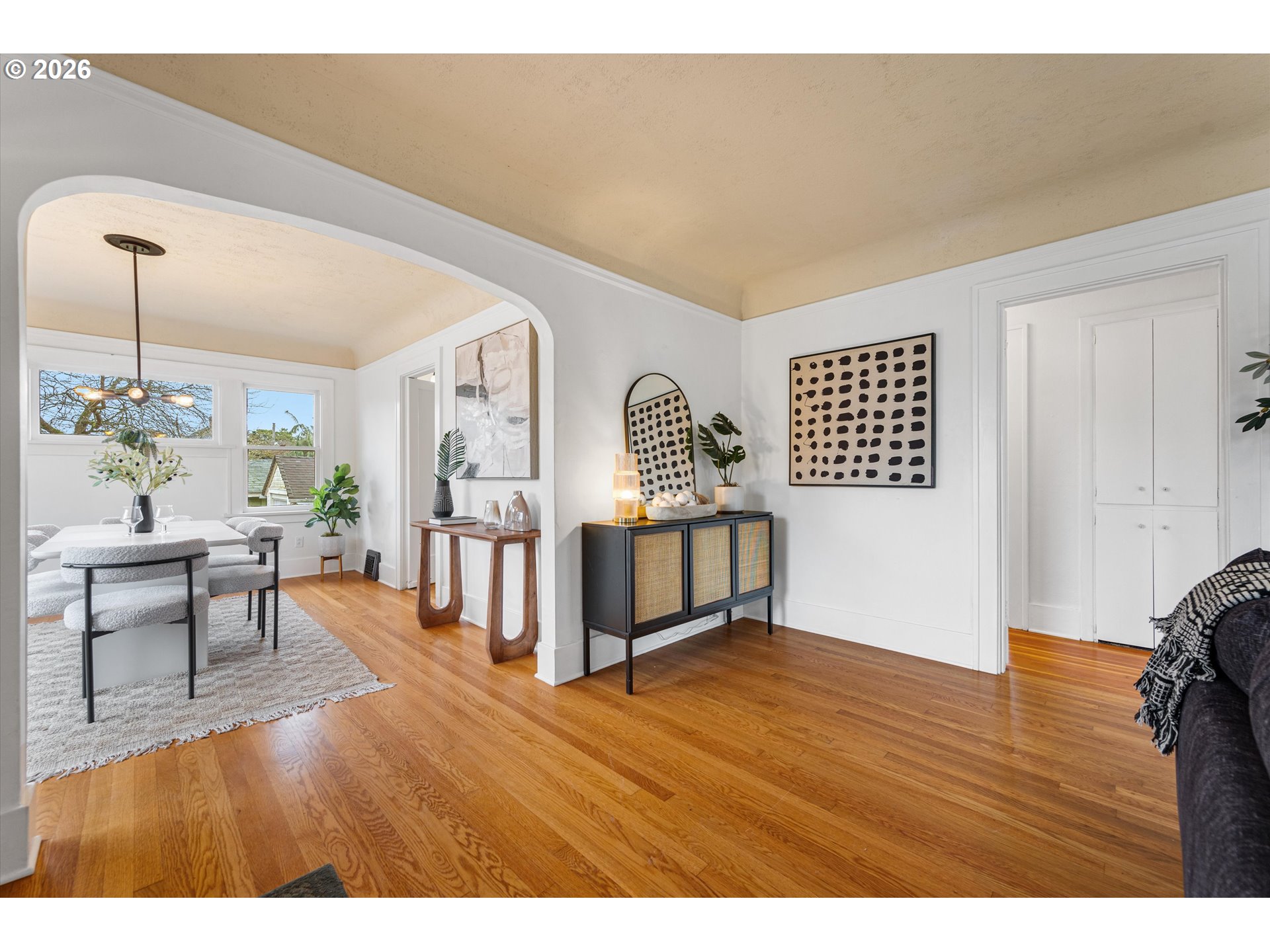 1706 Southeast Knapp Street Portland, OR 97202 - Photo 7 of 43 a living room with furniture and a wooden floor