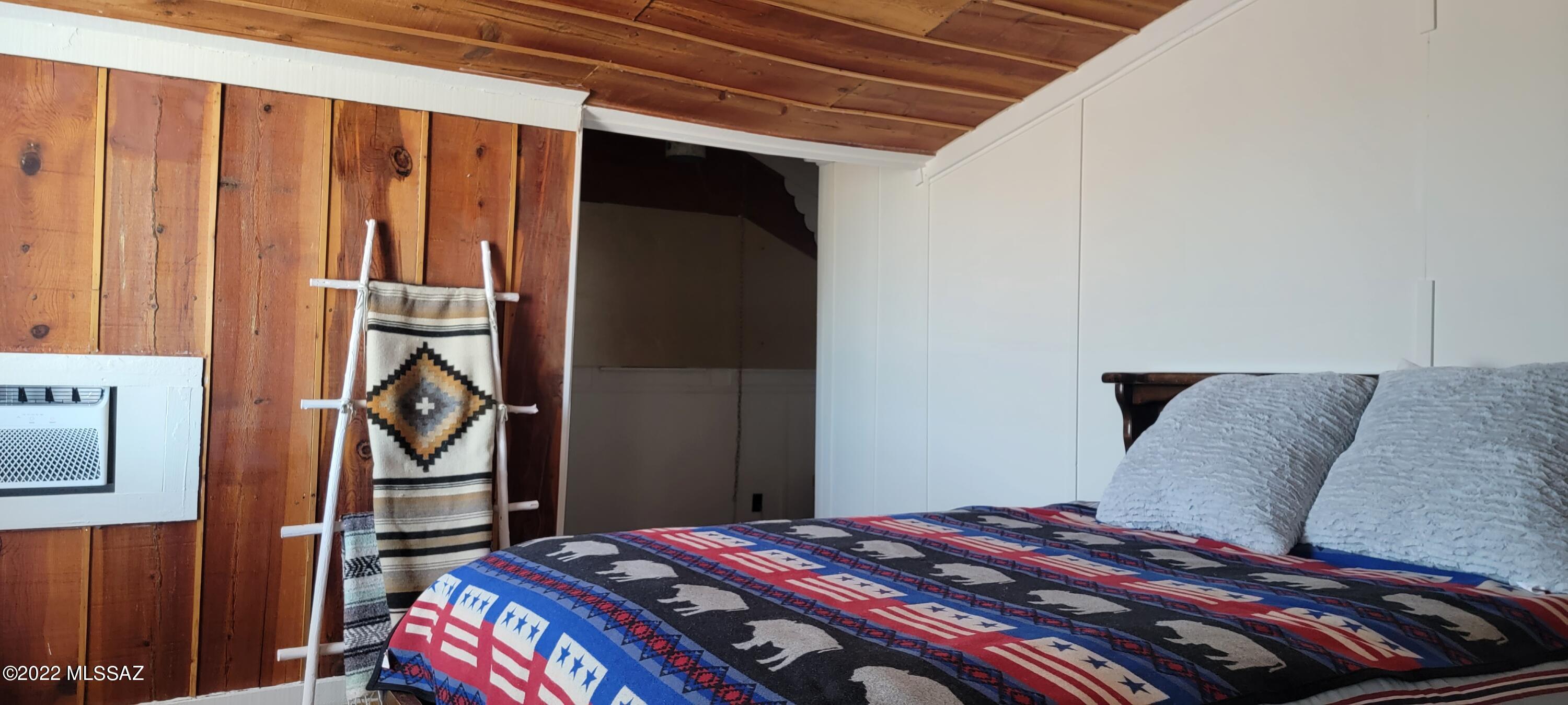 3399 Red Stag Road Pearce, AZ 85625 - Photo 29 of 47 a bedroom with a bed and a cabinets