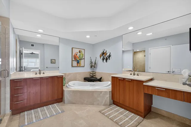a very nice looking kitchen with granite countertop a sink and a granite counter tops
