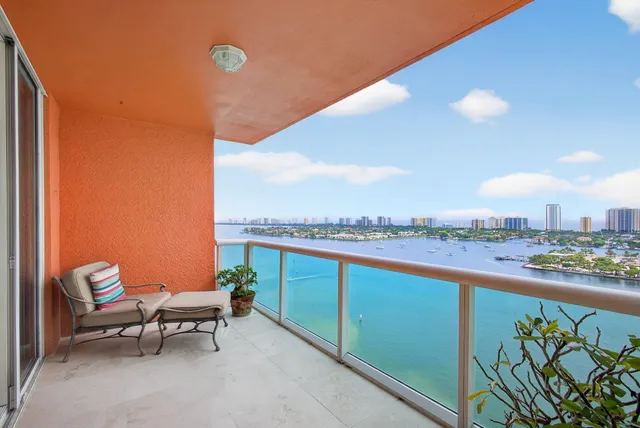 a view of a terrace with chairs and a table