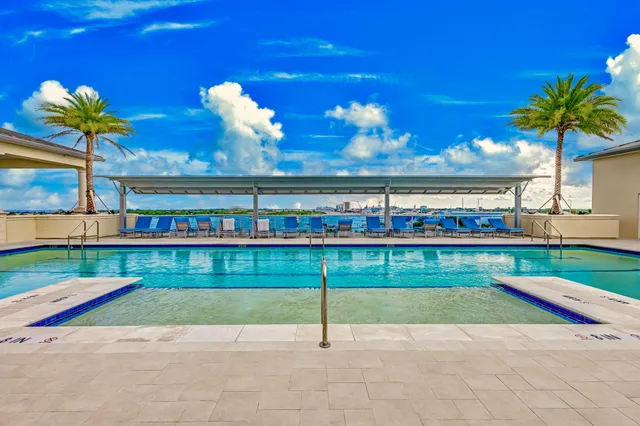 a view of a yard with a swimming pool