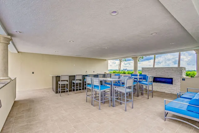 a view of a livingroom with furniture and a table