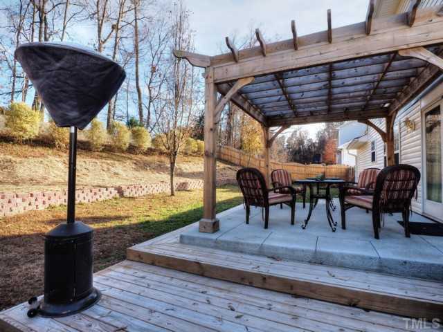 5645 Lighthall Lane Raleigh, NC 27604 - Photo 17 of 25 a view of a chairs and table on the wooden floor