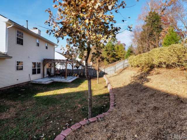 5645 Lighthall Lane Raleigh, NC 27604 - Photo 22 of 25 a view of a house with a yard