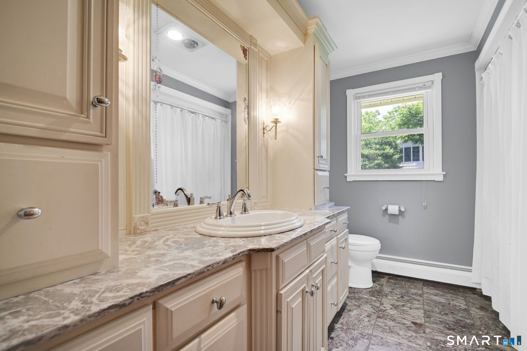 7 Rogers Drive Meriden, CT 06450 - Photo 17 of 40 a bathroom with a granite countertop sink and a mirror