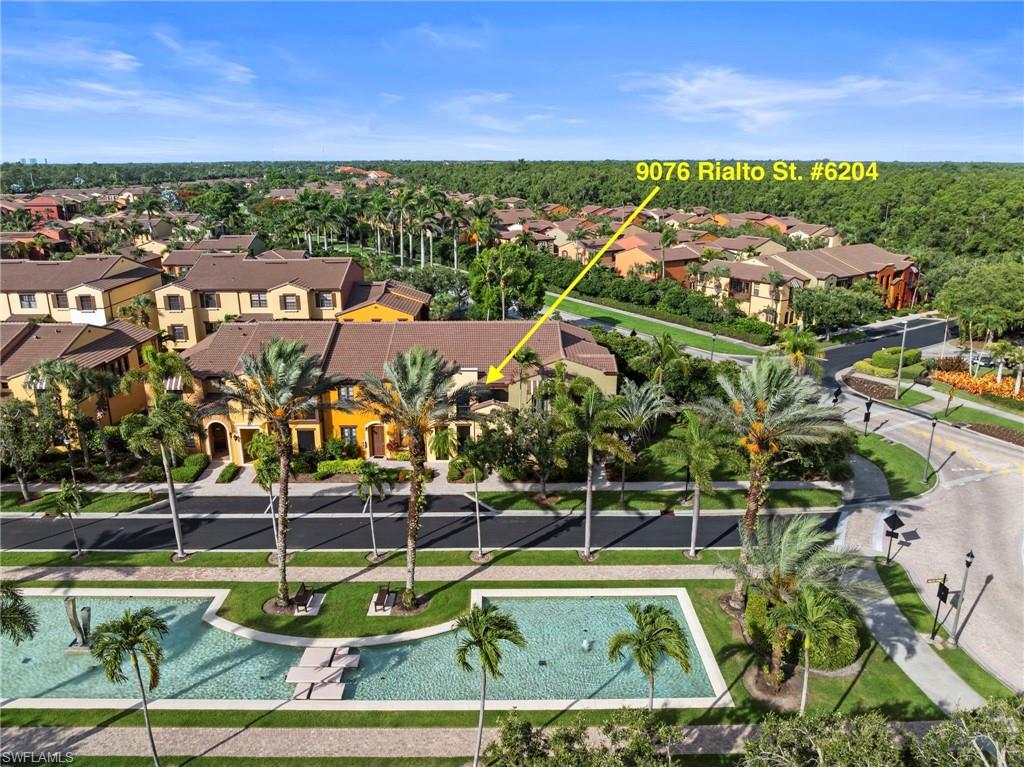 9076 Rialto Street, Unit 6204 Naples, FL 34113 - Photo 34 of 50 The condo is located on a beautiful water feature boulevard. Mediterranean-style architecture with stucco exterior and tile roofing.NEW ROOF (2024)