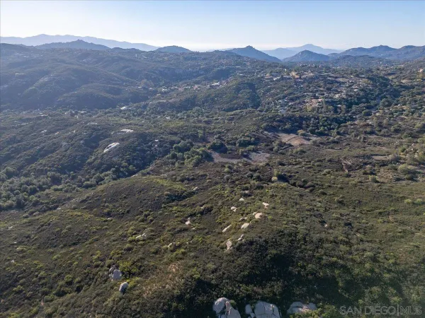 a view of a house with a mountain