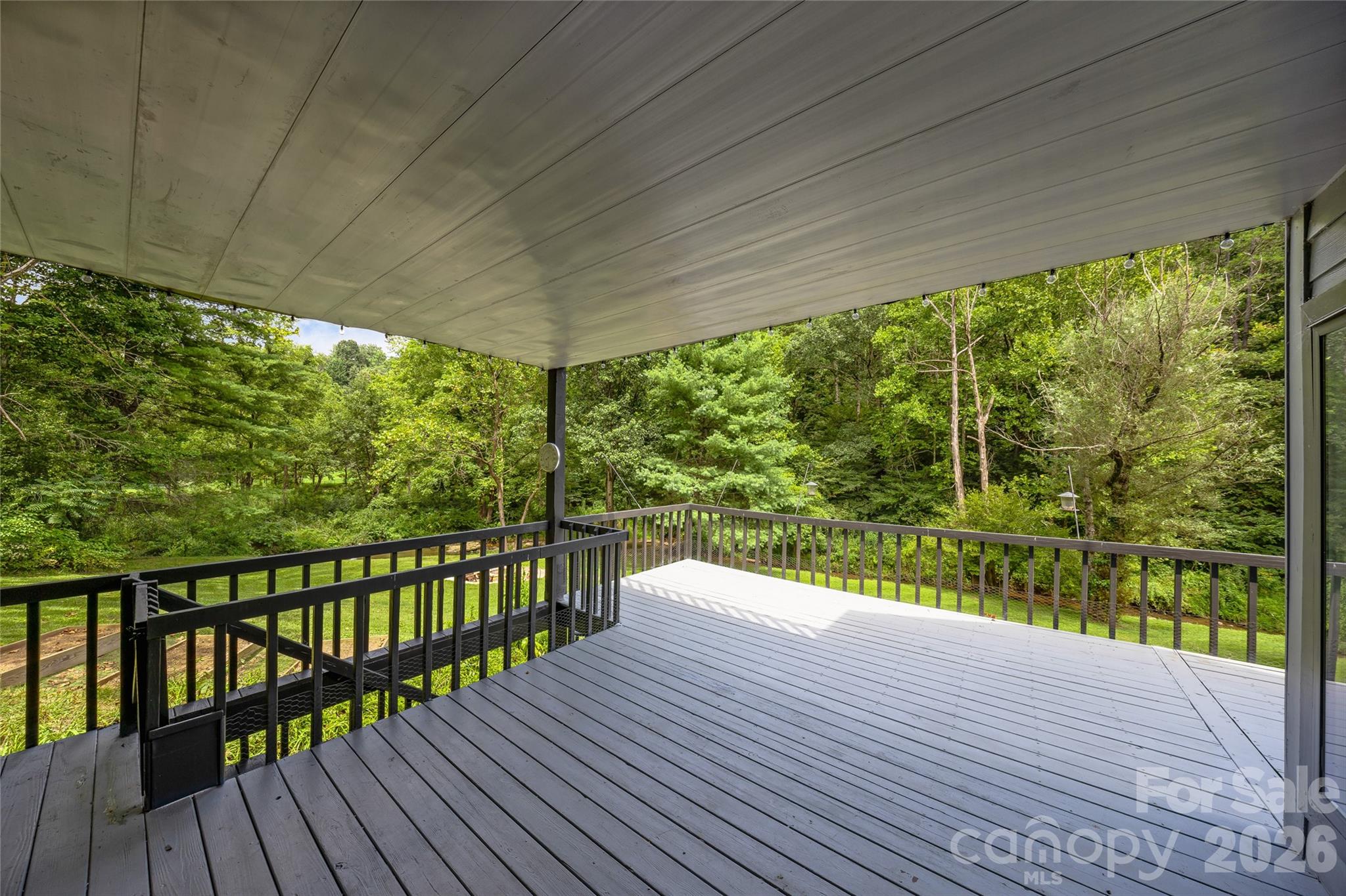 48 Merrell Road Leicester, NC 28748 - Photo 17 of 28 a view of a balcony with wooden floor