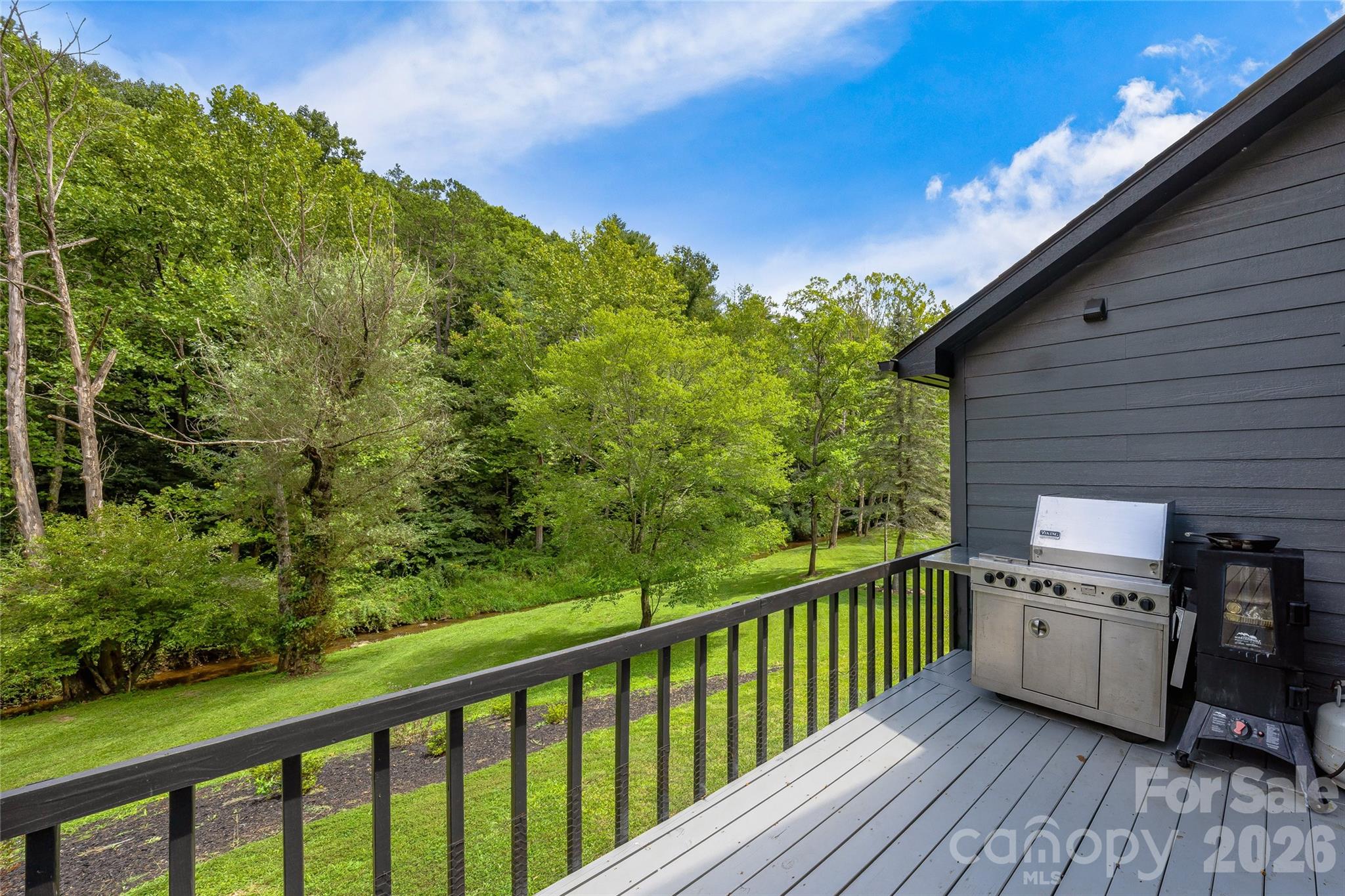 48 Merrell Road Leicester, NC 28748 - Photo 23 of 28 a view of a balcony with wooden floor
