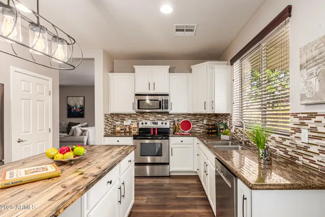 a view of a hallway with staircase