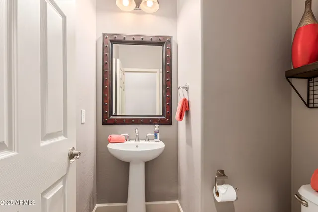 a living room with furniture potted plant and a window