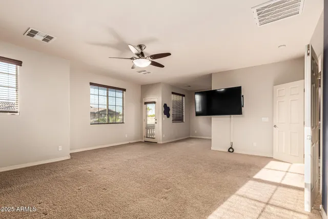 a white bath tub with a shower
