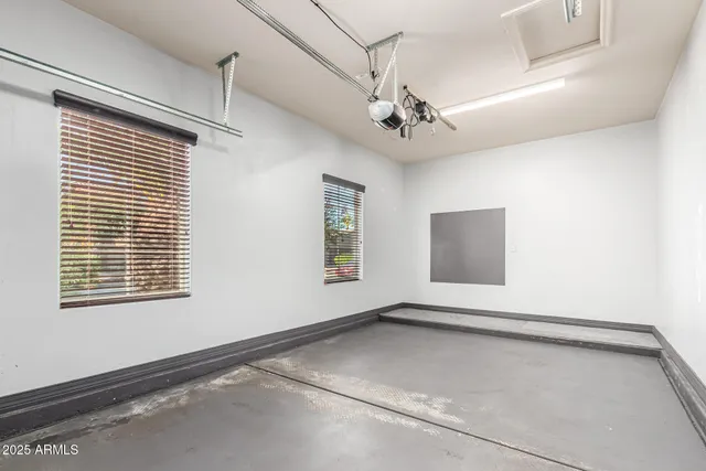 a view of a balcony with yard