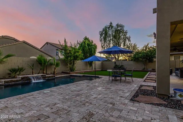 a view of a house with swimming pool