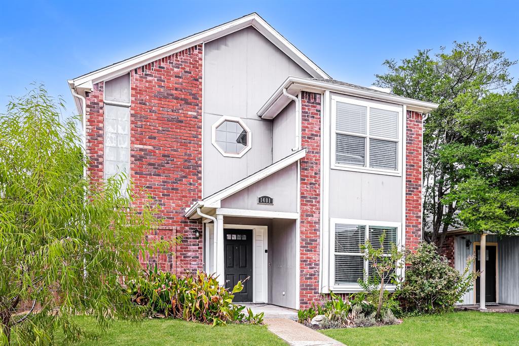 1401 Del Rio Drive Mesquite, TX 75149 - Photo 2 of 17 a front view of a house with garden