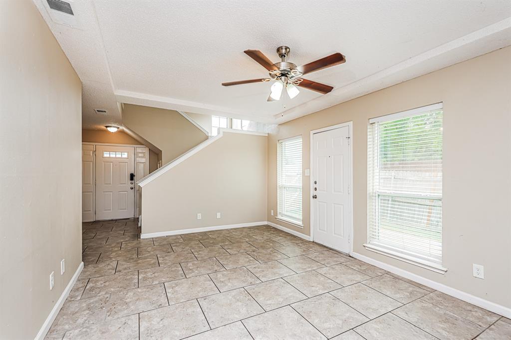 1401 Del Rio Drive Mesquite, TX 75149 - Photo 4 of 17 a view of an empty room with a window