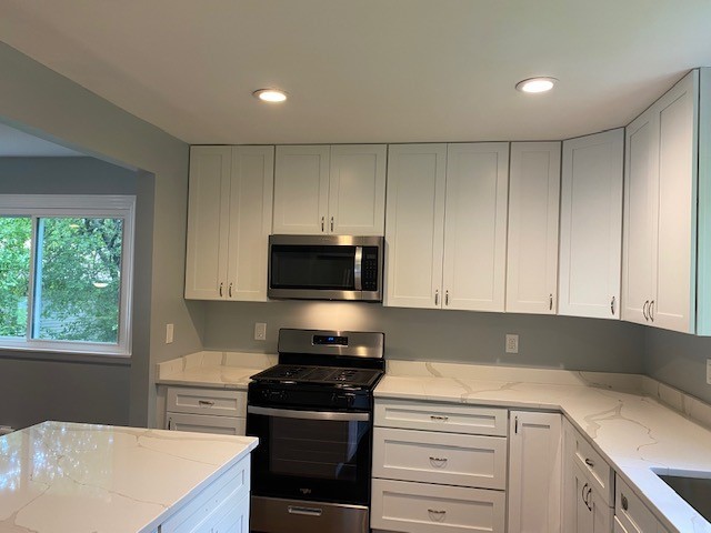 7 Treebark Court Schaumburg, IL 60193 - Photo 11 of 29 a kitchen with a sink and a stove top oven