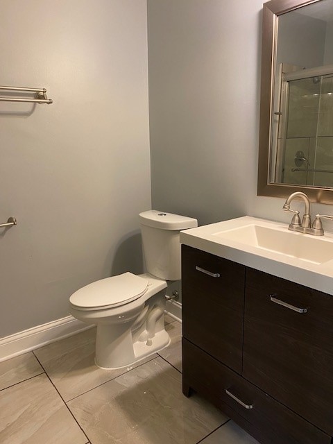 7 Treebark Court Schaumburg, IL 60193 - Photo 22 of 29 a bathroom with a sink and a toilet