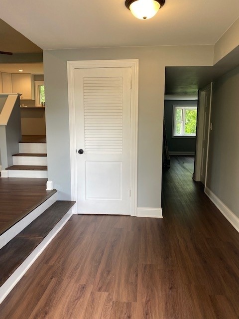 7 Treebark Court Schaumburg, IL 60193 - Photo 3 of 29 wooden floor in an empty room with a window