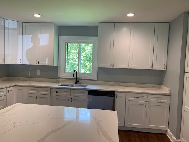 7 Treebark Court Schaumburg, IL 60193 - Photo 10 of 29 a kitchen with a sink stove and cabinets