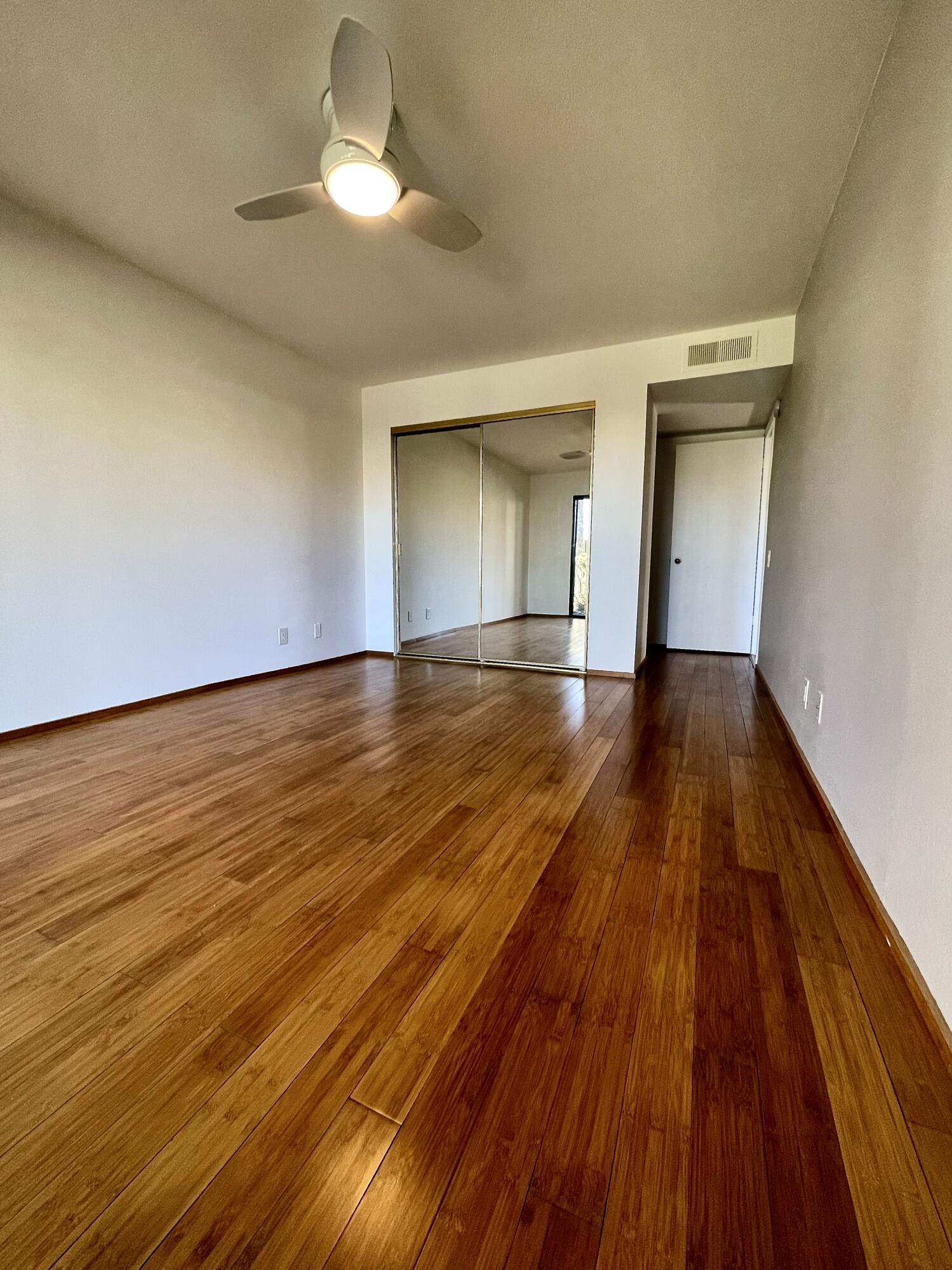 310 East San Jose Road, Unit 110 Palm Springs, CA 92264 - Photo 15 of 34 a view of empty room with wooden floor