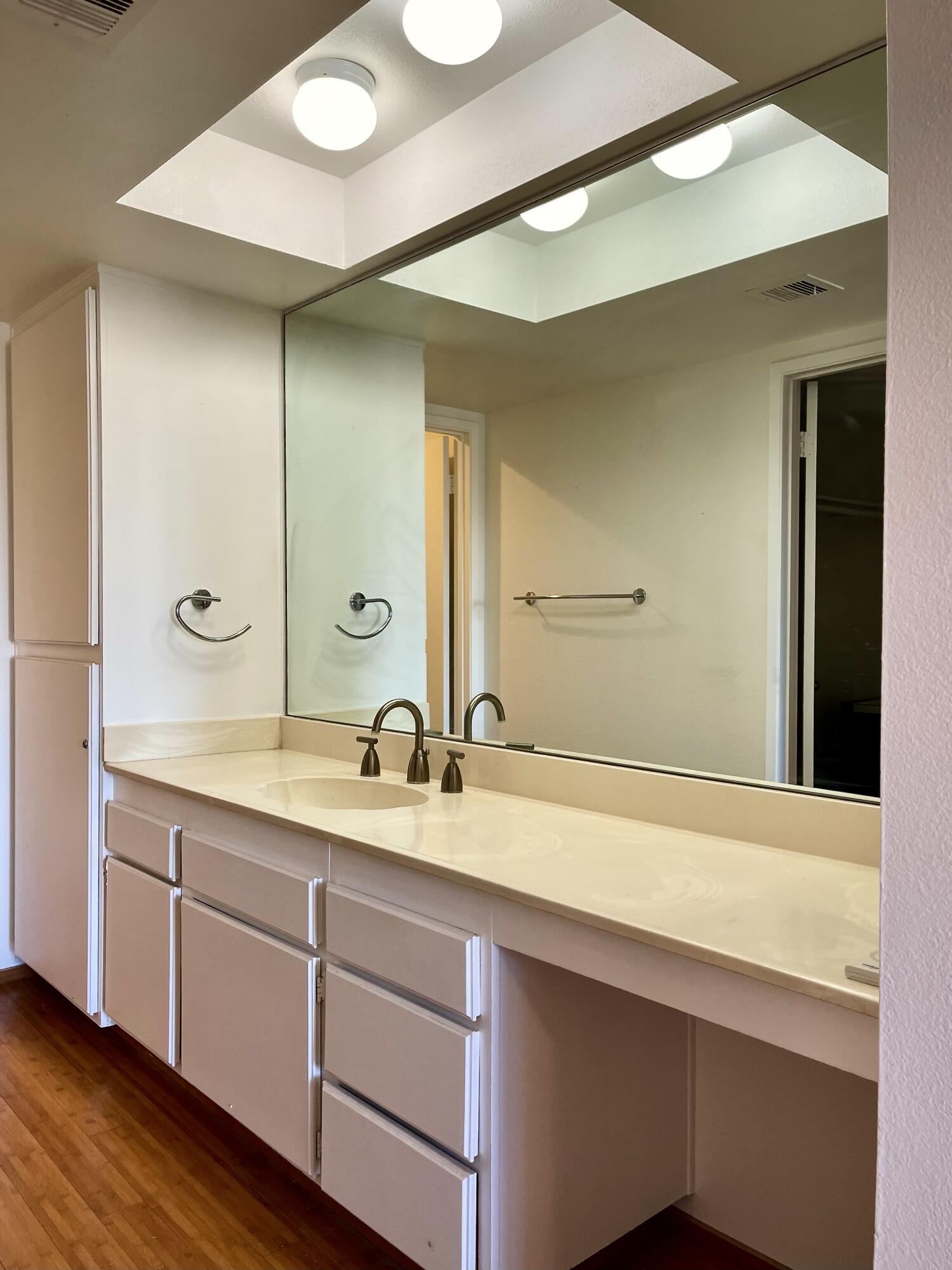 310 East San Jose Road, Unit 110 Palm Springs, CA 92264 - Photo 20 of 34 a bathroom with a sink and a mirror
