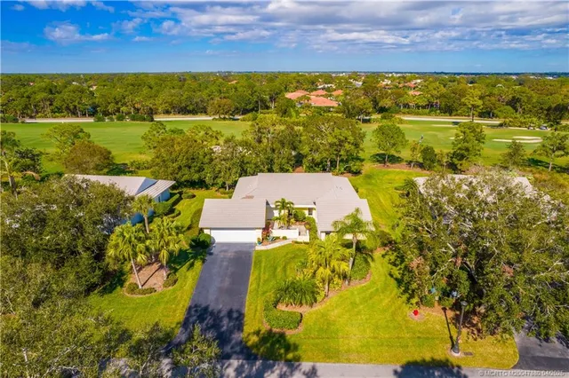 a view of a lake with a building in the background